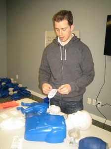 Using an AED during a CPR training course